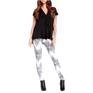 VINCE Dylan Coated beat down brushstroke print gray and white skinny jeans.